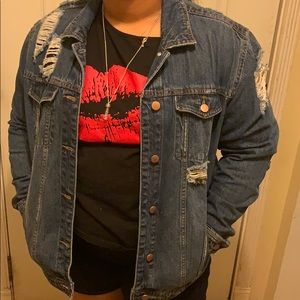 Blue ripped jeans jacket
